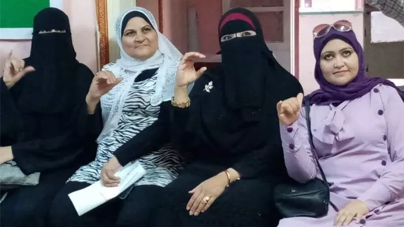لغة الإشارة في محاضرات بلجنة المرأة بوفد الفيوم