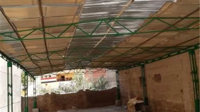 سوق مركزى بحي غرب أسيوط ومنافذ لبيع المواد الغذائية المخفضة للمواطنين
