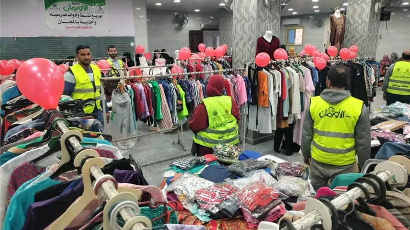 ٧ آلاف قطعة ملابس مجانا من الاورمان ل ٧٠٠ أسرة أولى بالأقصر