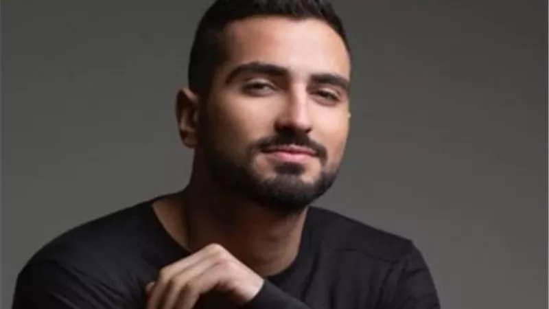 محمد الشرنوبى يغنى مع عمه فى حفل الرياض