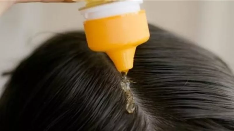 4 فوائد لزيت السمسم على صحة الشعر..تعرف عليها