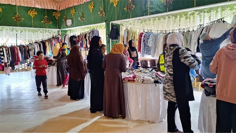 الاورمان توزع ملابس جديدةعلى الاولى بالرعاية بالحسينية