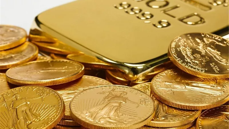 الذهب يتراجع والدولار يرتفع وسط ترقب لقرار الفيدرالي