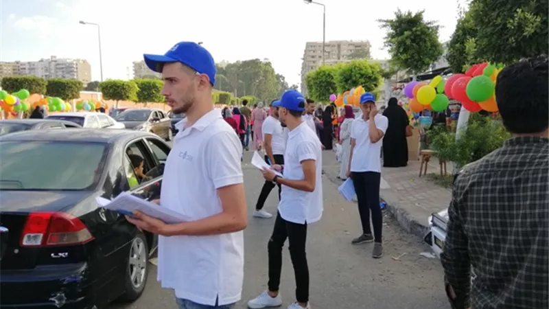 فريق متطوع من الشباب للتسجيل بمنظومة التأمين الصحى الشامل ببورسعيد.. صور