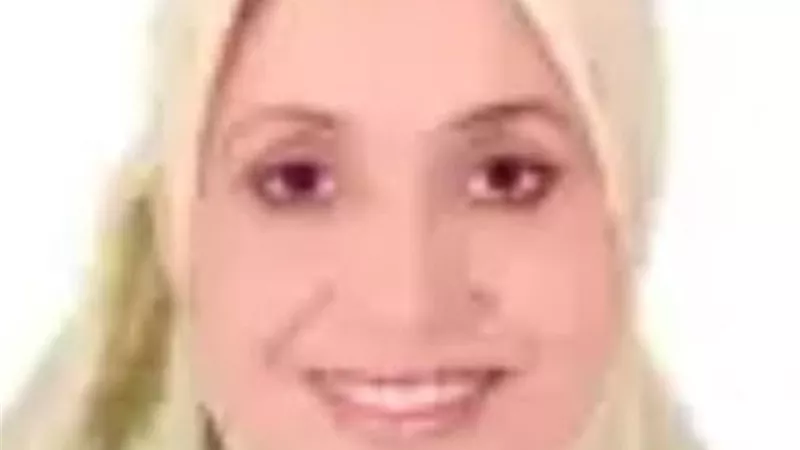 تكريم أستاذة جامعة أسيوط فى عيد العلم