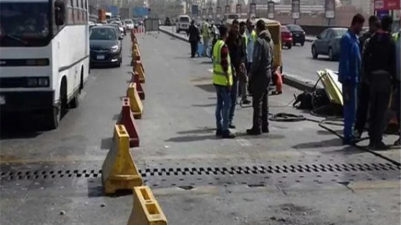 وضع حواجز حديدية بمحيط اغلاق شارع جامعة الدول