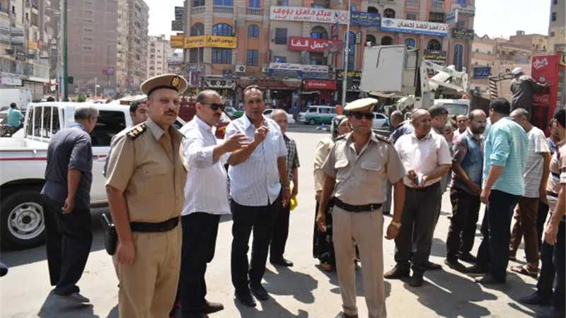 ازالة التعديات على الأرصفة و الطرق العامة بالفيوم