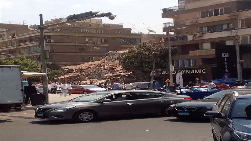 انتشال إحدى الناجيات من أسفل عقار أرض الجولف المنهار بمدينة نصر