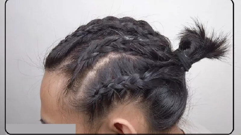 حكم ارتداء الرجل سلسلة فضة وربط شعره على هيئة ضفائر