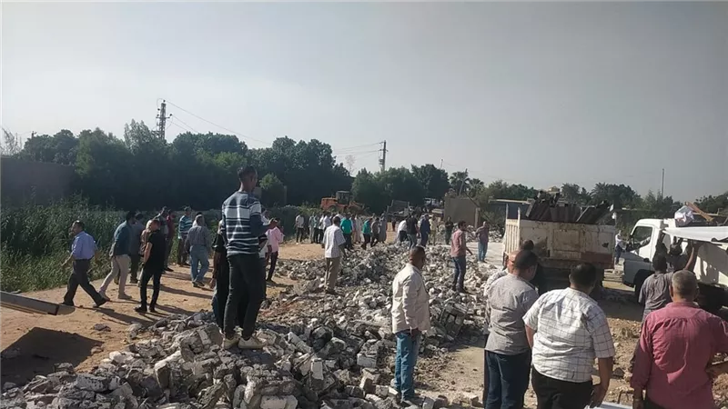 إزالة مخالفات بشارعي التحرير والجمعية بالدقي