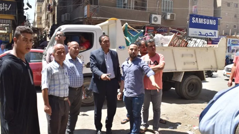 استمرار حملات الإزالة بشوارع وميادين الفيوم.. صور