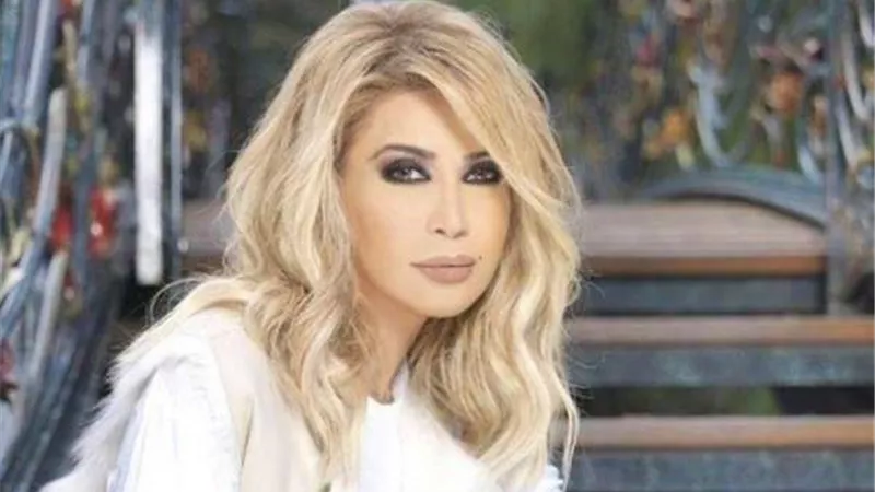 اطلالة ساحرة لنوال الزغبى وسط الاشجار