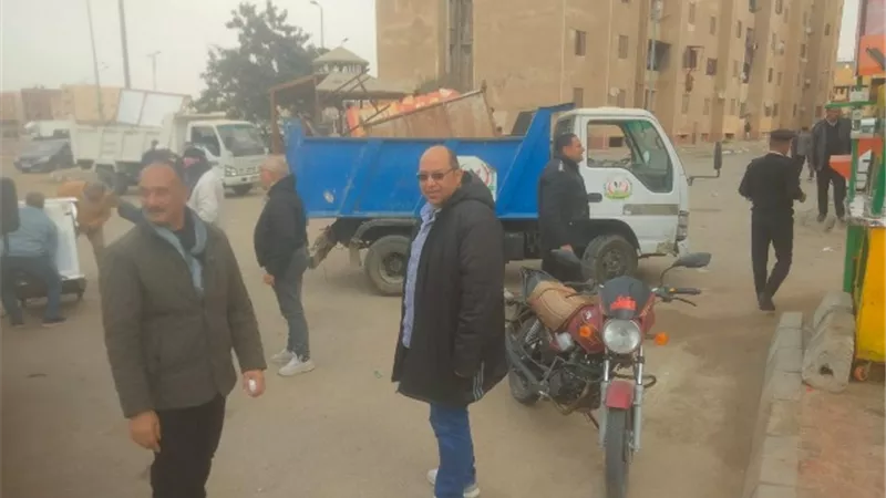 جهاز بدر يشن حملة شرسة على الإشغالات بالتعاون مع شرطة المرافق صور