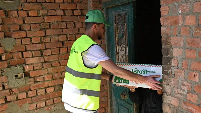 توزيع 550كرتونة رمضان على أهالي قرى مركز ملوى