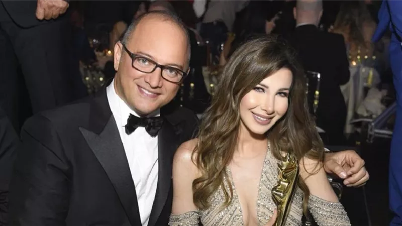نانسي عجرم تفاجئ متابعيها بصورة مع زوجها تكشف طولها الحقيقي