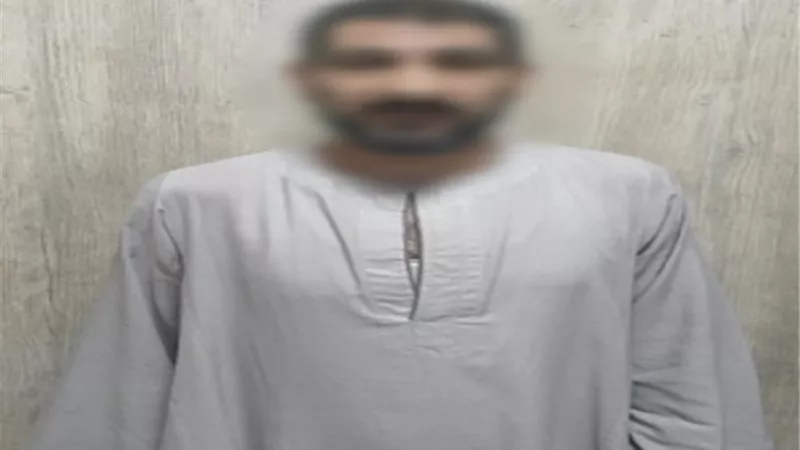 ضبط شخصين تعديا على سيدة بالسب والشتم بالجيزة