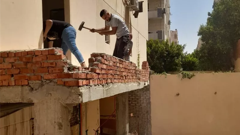 جهاز الشيخ زايد يزيل مخالفات بناء في منطقة المستثمر الصغير