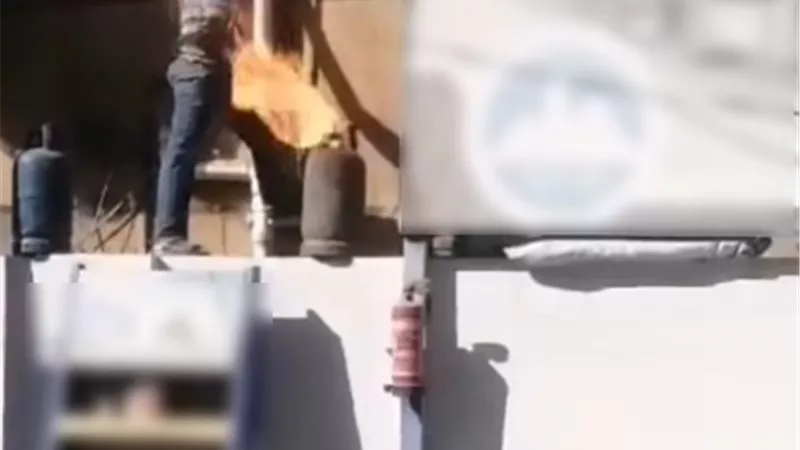 حقيقة فيديو لشخص يشعل إسطوانة بوتاجاز داخل محطة وقود بدمياط
