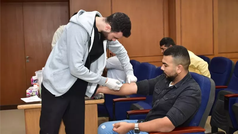 قافلة طبية من مستشفى العلمين النموذجي للكشف على موظفي الجهاز