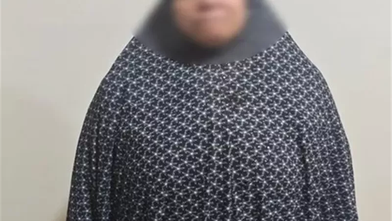 ضبط سيدة بحوزتها كروت دعائية لأحد المرشحين لتوزيعها على الناخبين