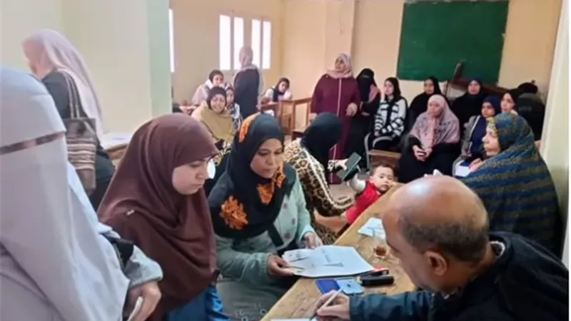 دعم تمكين المرأه واستخراج بطاقات الرقم القومي بالمجان