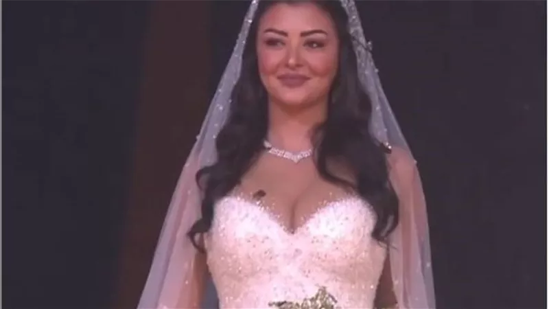 ربع مليون جنيه .. سعر فستان زفاف زوجة مدرب منتخب مصر السابق