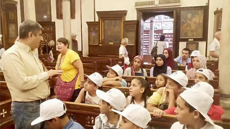 بالصور.. أبناء الصحفيين فى زيارة لملتقى الأديان