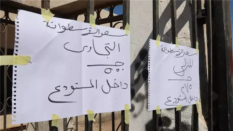 كتابة الأسعار على سيارات توزيع اسطوانات البوتاجاز بالإسماعيلية