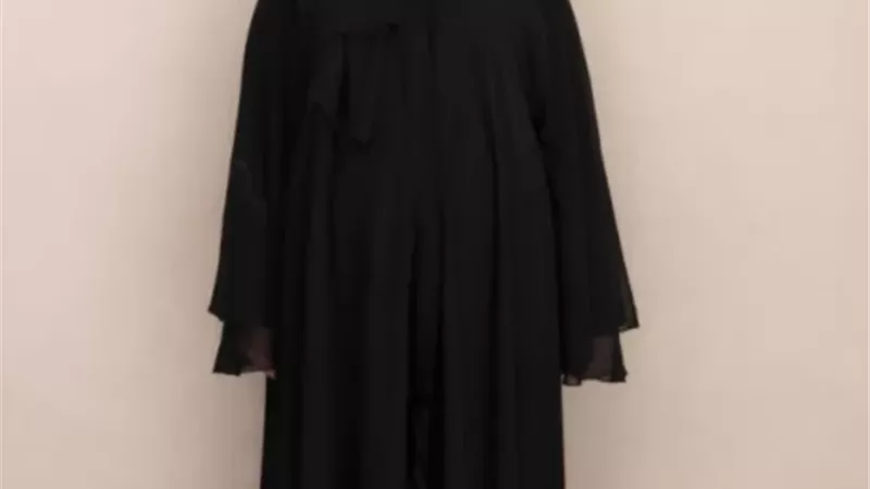 ضبط ربة منزل تعدت على سائق 