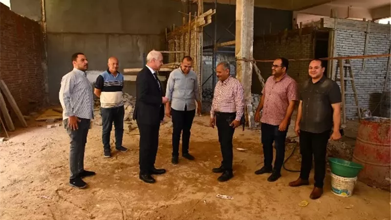عبد المولى يتفقد مقرفرع البنك الأهلي المصري بمجمع الخدمات المركزى