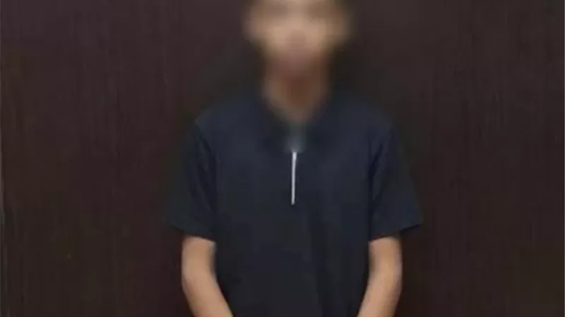 ضبط عامل بقالة هدد طلاب ب