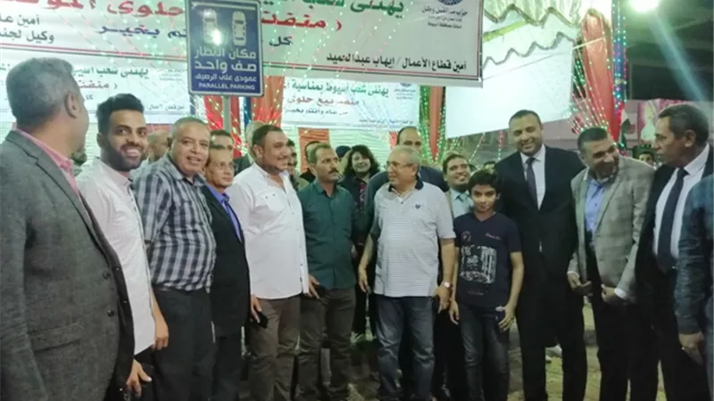 مستقبل وطن اسيوط يفتتح منفذ لبيع حلويات المولد النبوى باسعار مخفضة بالصور