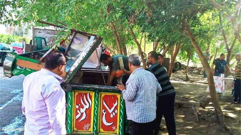 رفع 16 عربة ماكولات وتحرير 12 محضر اشغالات فى البساتين بالصور