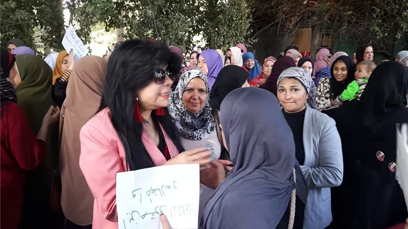 وقفة تضامنية لجمعية نهوض المرأة للحفاظ على حقوق المرأة والطفل