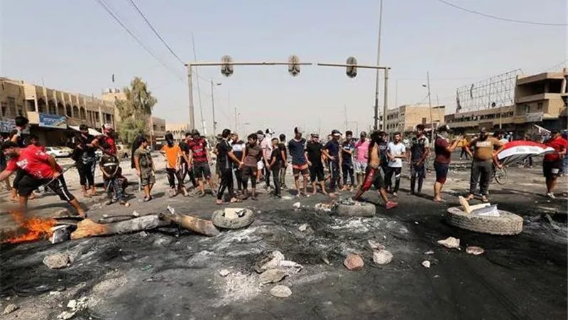 اعلام شرطة ذى قار: حاولنا إبعاد المتظاهرين منعاً لإراقة الدماء