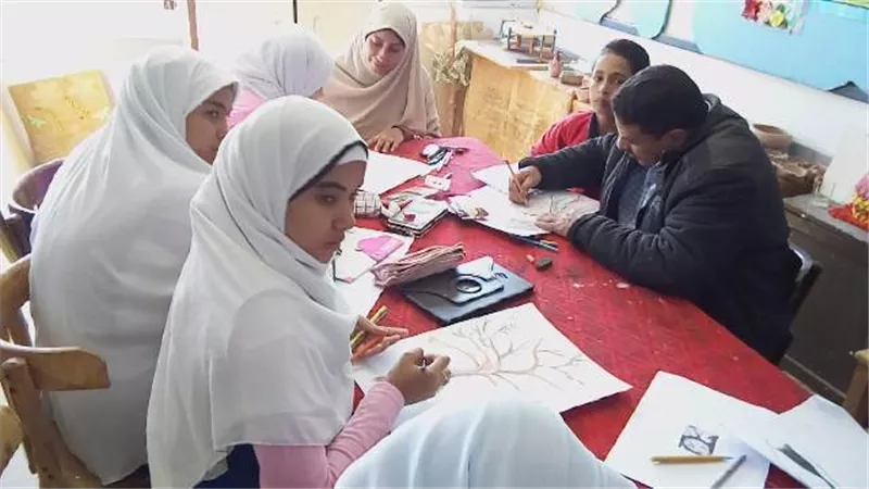 العنف ضد المرأة فى مسابقة للرسم الفنى بالوادى الجديد.صور