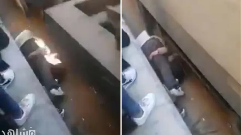 شاهد ....اب ينقذ طفلته من الموت تحت عجلات القطار