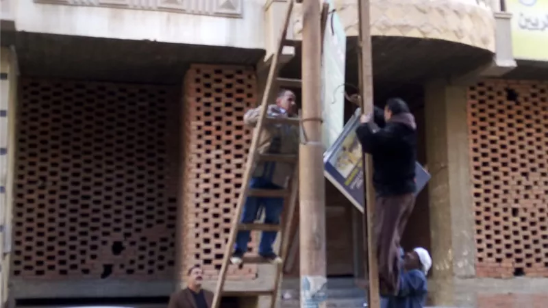 رفع 437 حالة إشغالات وإعلانات بشوارع بني سويف