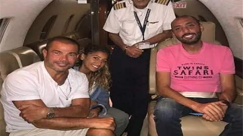 بعد أزمة محمد رمضان.. أحدث صورة للطيار المفصول مع الهضبة في ممر طائرة
