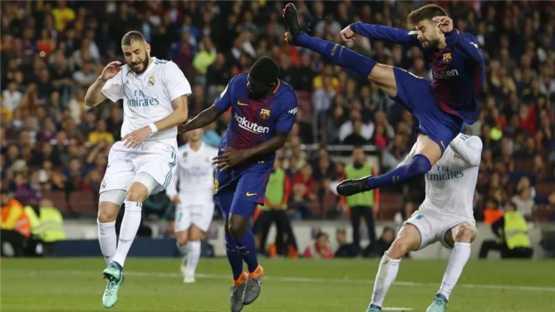 ريال مدريد يخطف الفوز من برشلونة بهدفين ويعتلى قمة الدورى الأسبانى