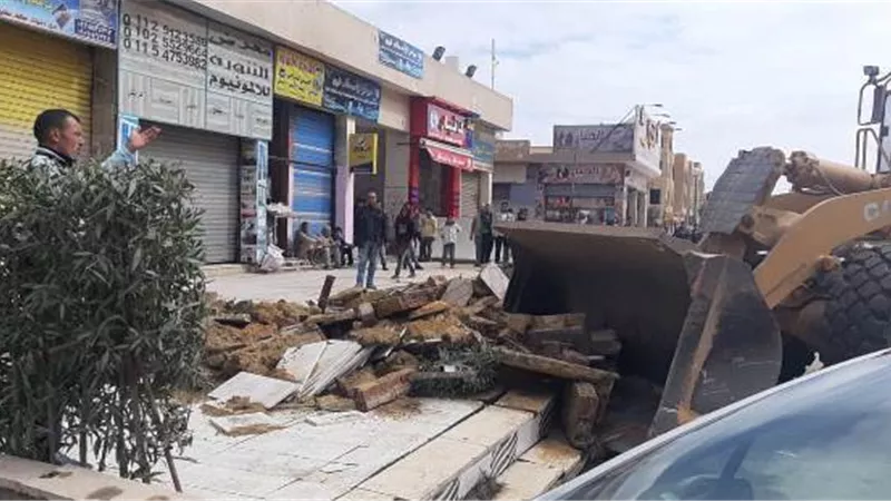 جهاز حدائق أكتوبر يشن حملة لإزالة التعديات وغلق وتشميع المحال المخالفة بالمدينة