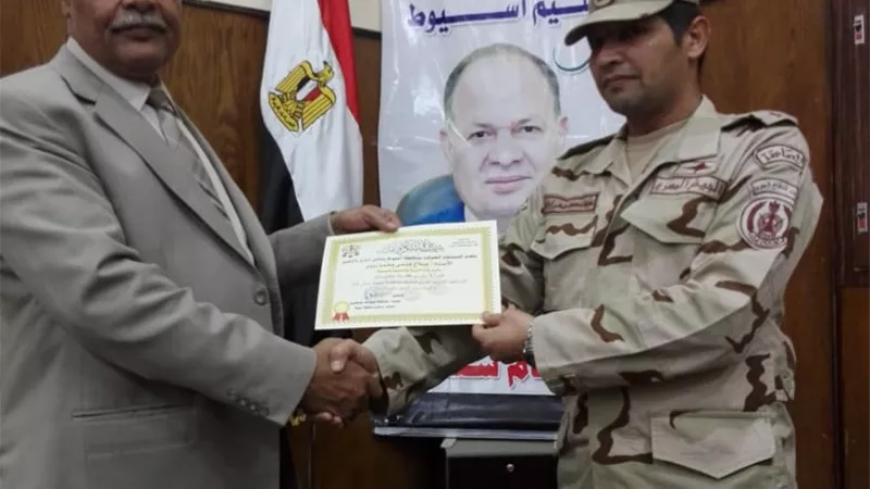 الدفاع الشعبى يكرم وكيل تعليم أسيوط لتحويله مدرستين ثانوى لتأسيس عسكرى