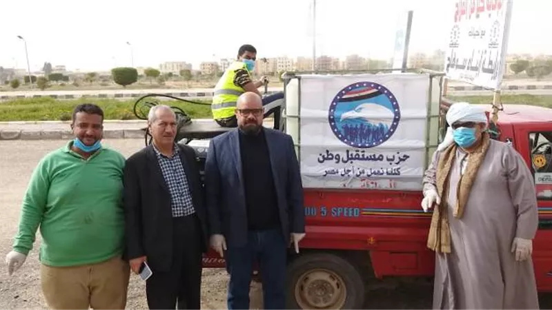 مستقبل وطن بدر ورابطة أبناء سوهاج يكافحان كورونا فى الشوارع وتطهير المنشأت بالصور