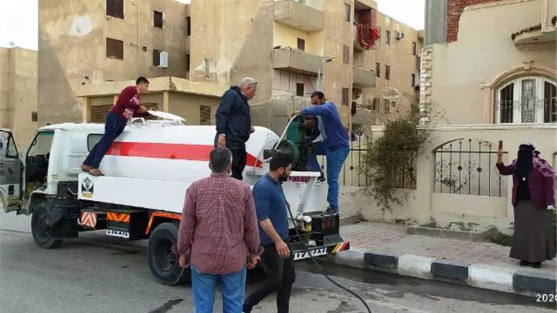جهاز العبور يكافح خطر كورونا باللوحات الإرشادية وتطهير الشوارع.. بالصور