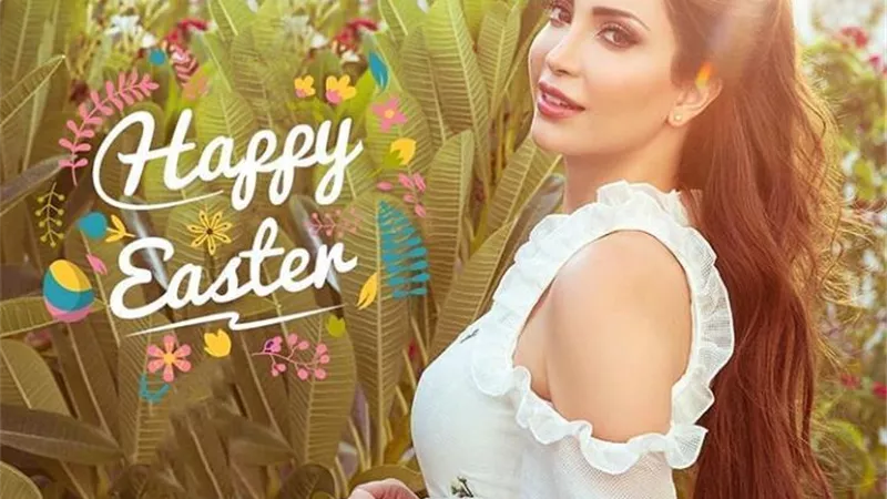 وسط الورود .. نسرين طافش تهنئ الأخوة الأقباط بعيد الفصح