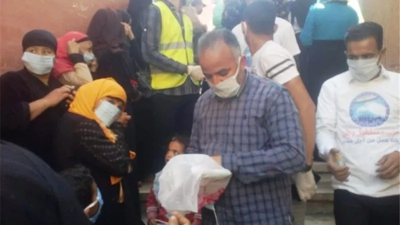 مستقبل وطن أبنوب يطهر البنوك الزراعية ويوزع كمامات على العمالة غير المنتظمة.. بالصور