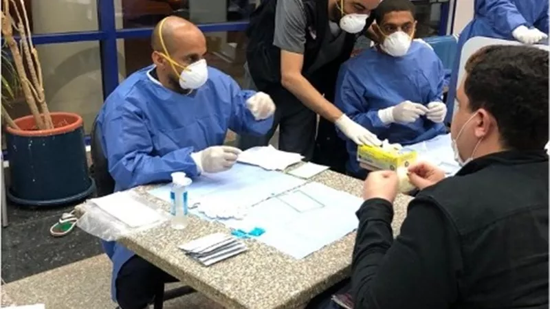 وصول رحلة واشنطن وعلى متنهما 327 عالق مصرى