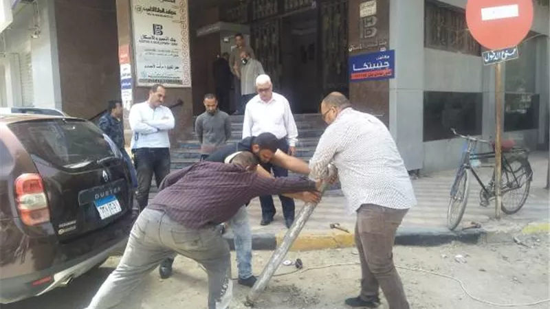 حملة مكبرة بالدقي لضبط المخالفات