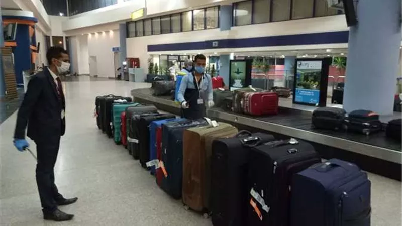 فحص 223 مصريا من العالقين العائدين بأمريكا قبل نقلهم لمناطق العزل الصحى