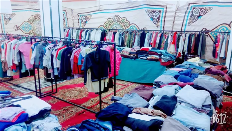 الاورمان توزع ملابس جديدة على الاسر الاولى بالرعاية
